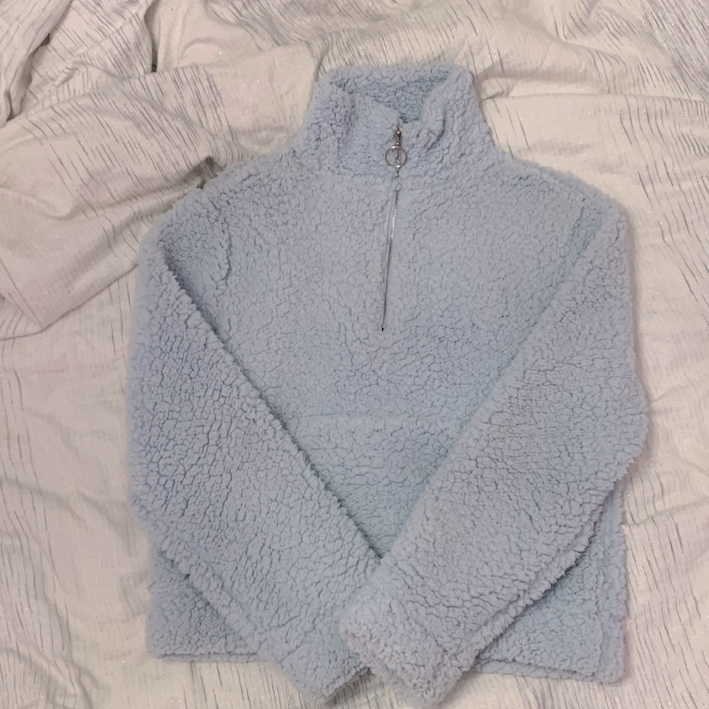 Beautiful blue half zip up sweater. Very soft material, great for the winter!